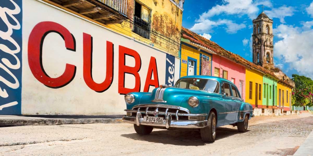 Vintage car and mural- Cuba