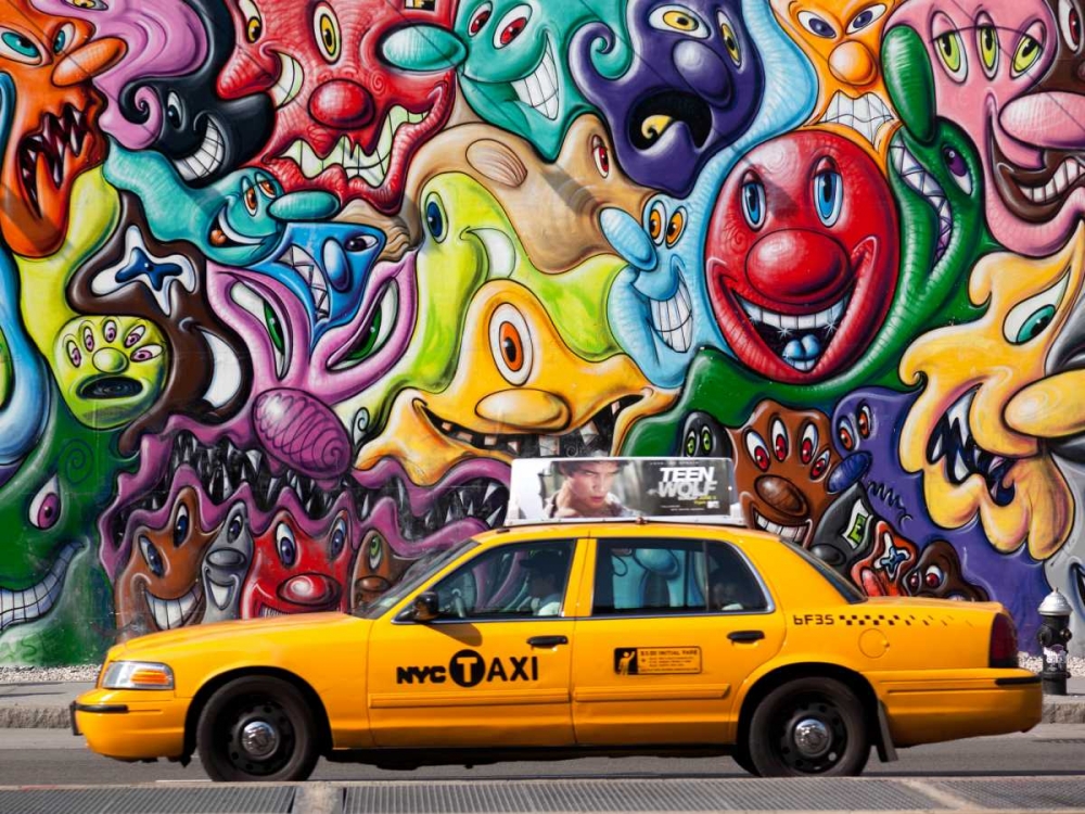 Taxi and mural painting in Soho, NYC