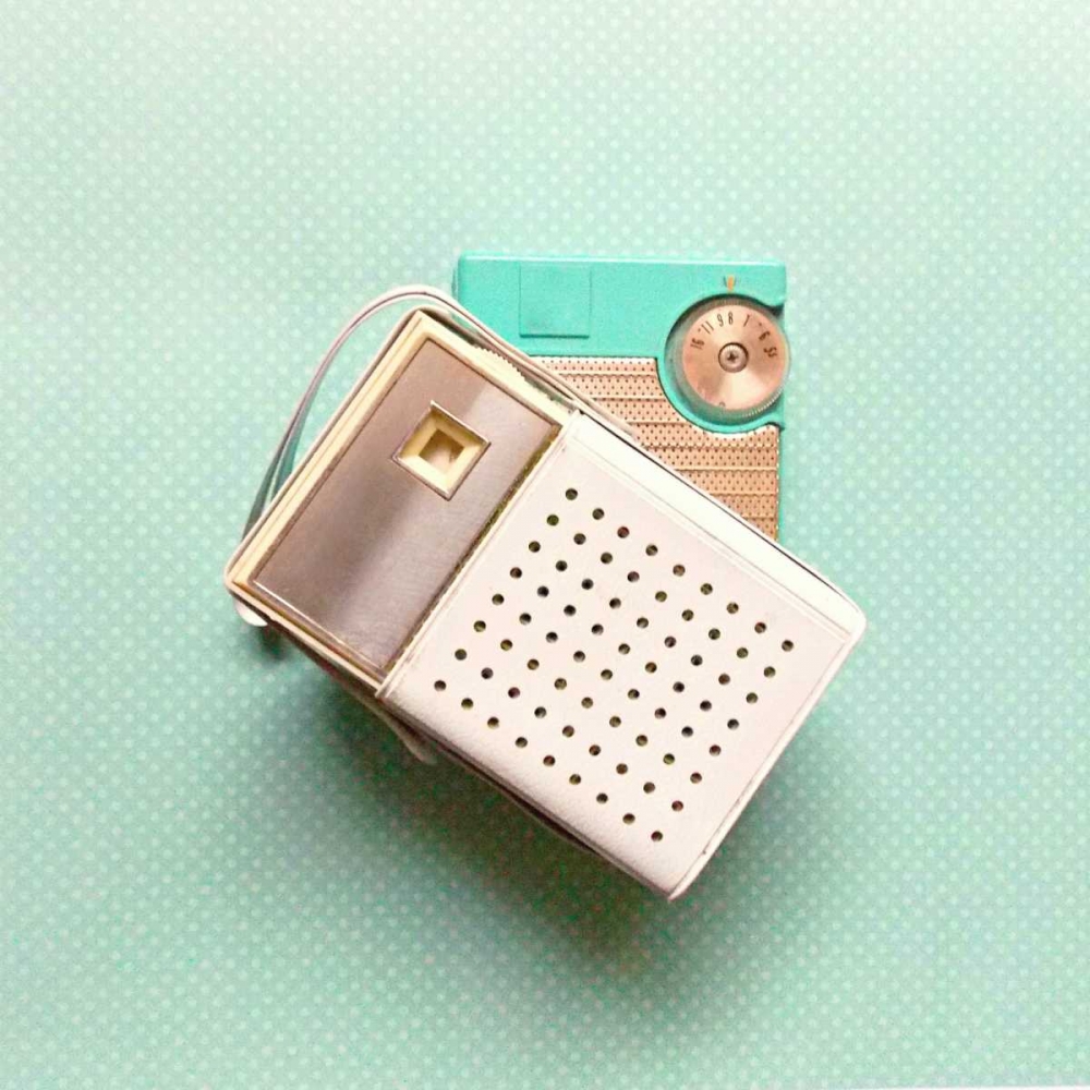 Vintage Transistor Radio on Blue