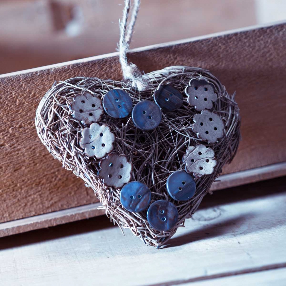 Heart made of straw with buttons