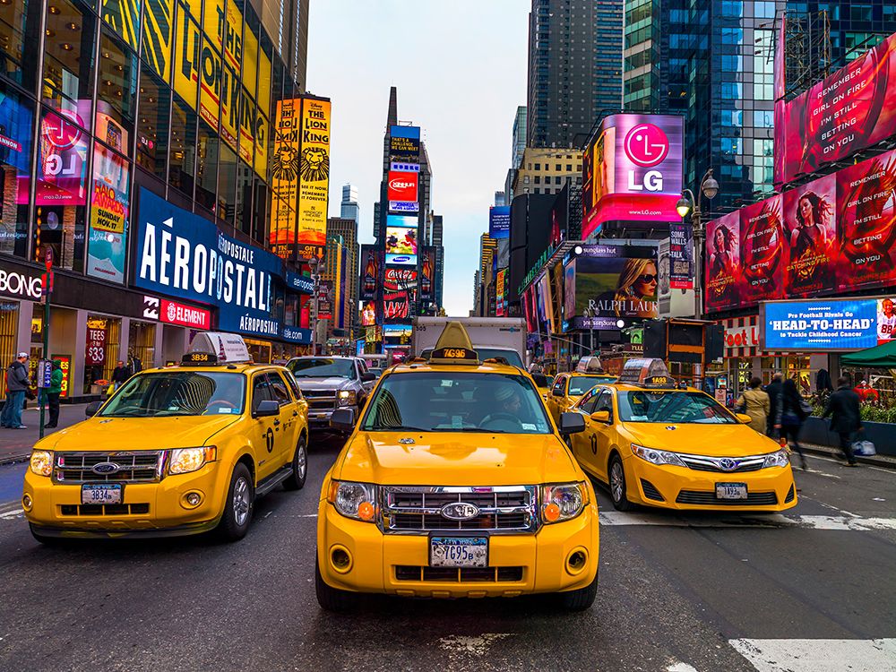 Taxis on broadway, New York