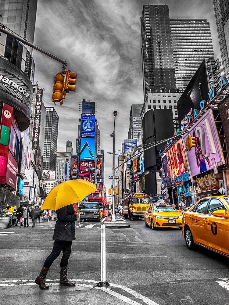 Man with yellow umbrella at Times square, New York