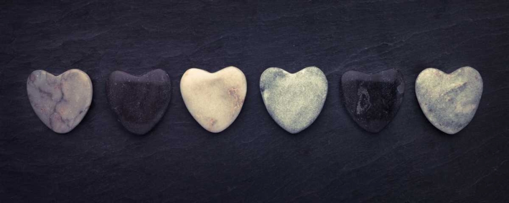 Heart shaped stones in a row