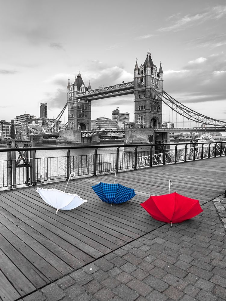 Colorful umbrellas on promenade near Tower bridge, London, UK