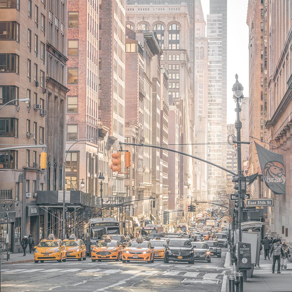 Streets of New york with cars and yellow taxis on the traffic signal