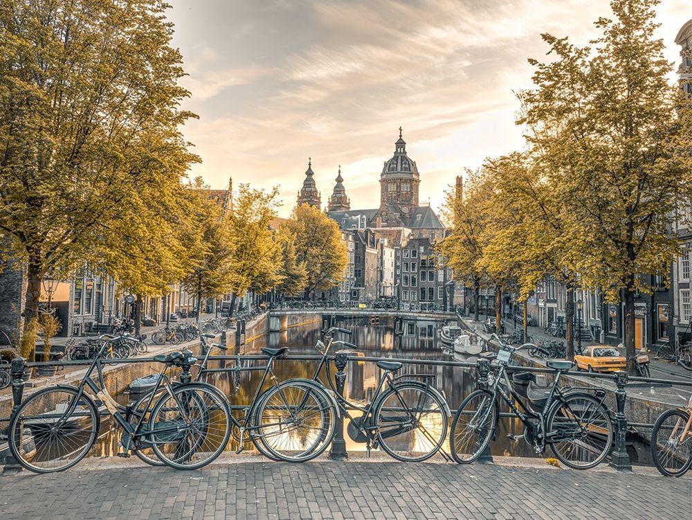 Bicycles parked along the canal-Amsterdam