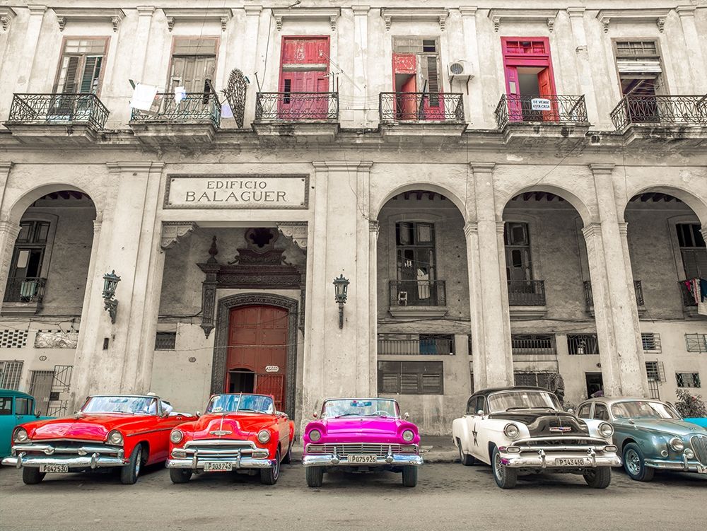 Traditional cuban cars parked in row by the road in Havava, Cuba,