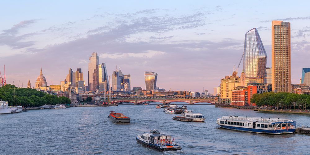 Evening view of London city skyline with river thames