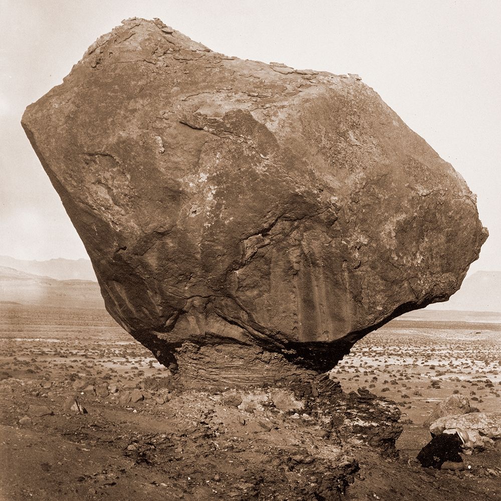 Perched Rock, Rocker Creek, Arizona, with sitting man, 1872