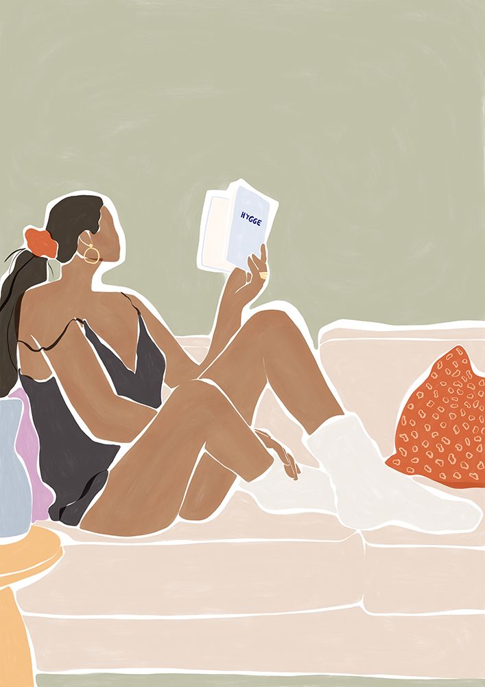 Woman Enjoying A Great Hygge Book