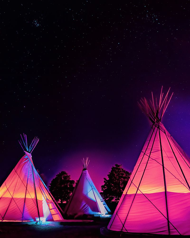 Vaporwave Teepees Glowing at Night Under Stars In Marfa Texas