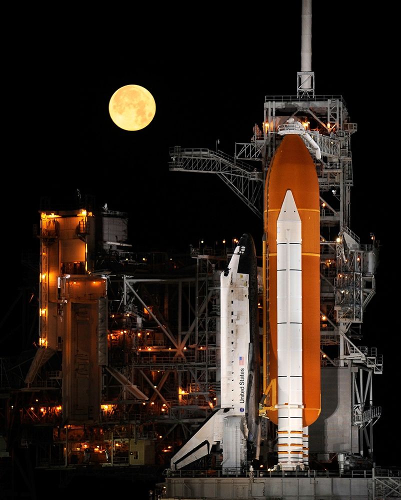 Shuttle Discovery With Moon