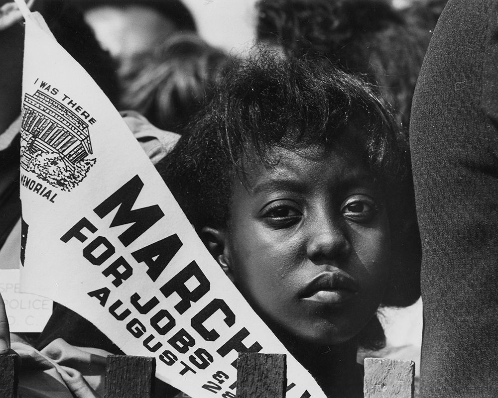 Young Woman at the Civil RightsÂ MarchÂ onÂ Washington-D.C. with a Banner