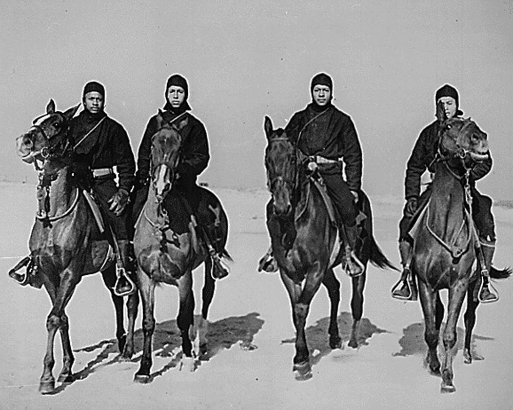 WWII members of a Coast Guard Horse Patrol unit