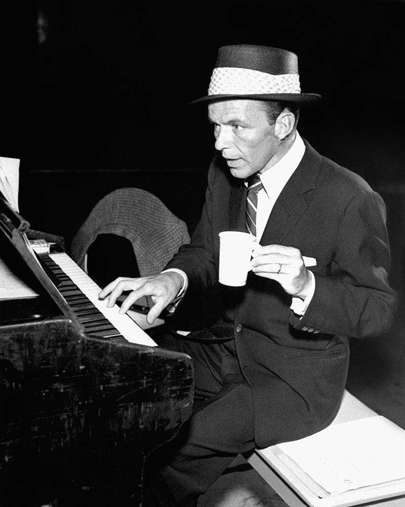 Frank Sinatra at the piano, 1954