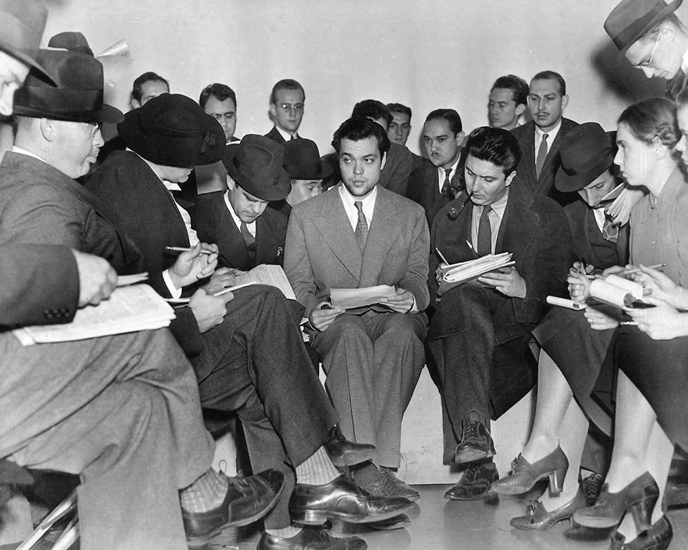 Orson Welles with reporters after the War of the Worlds radio broadcast, 1938