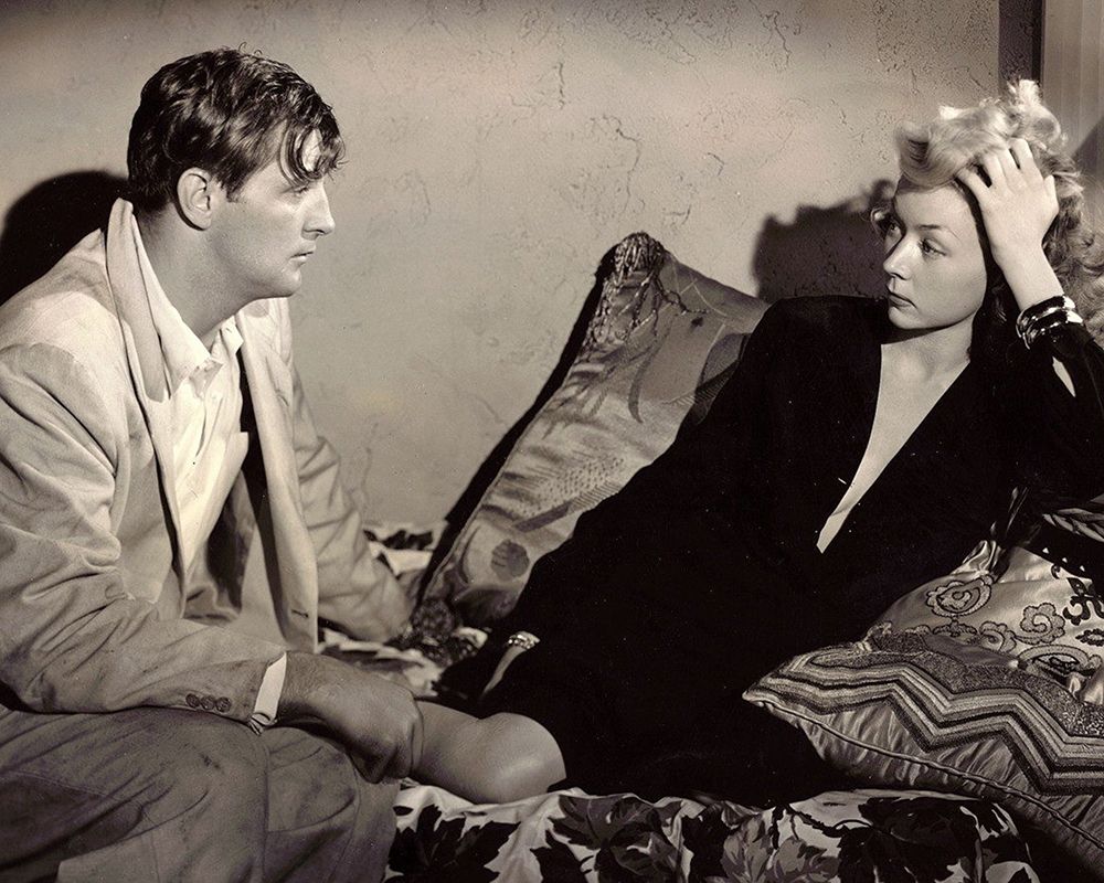Robert Mitchum, Gloria Grahame, 1952