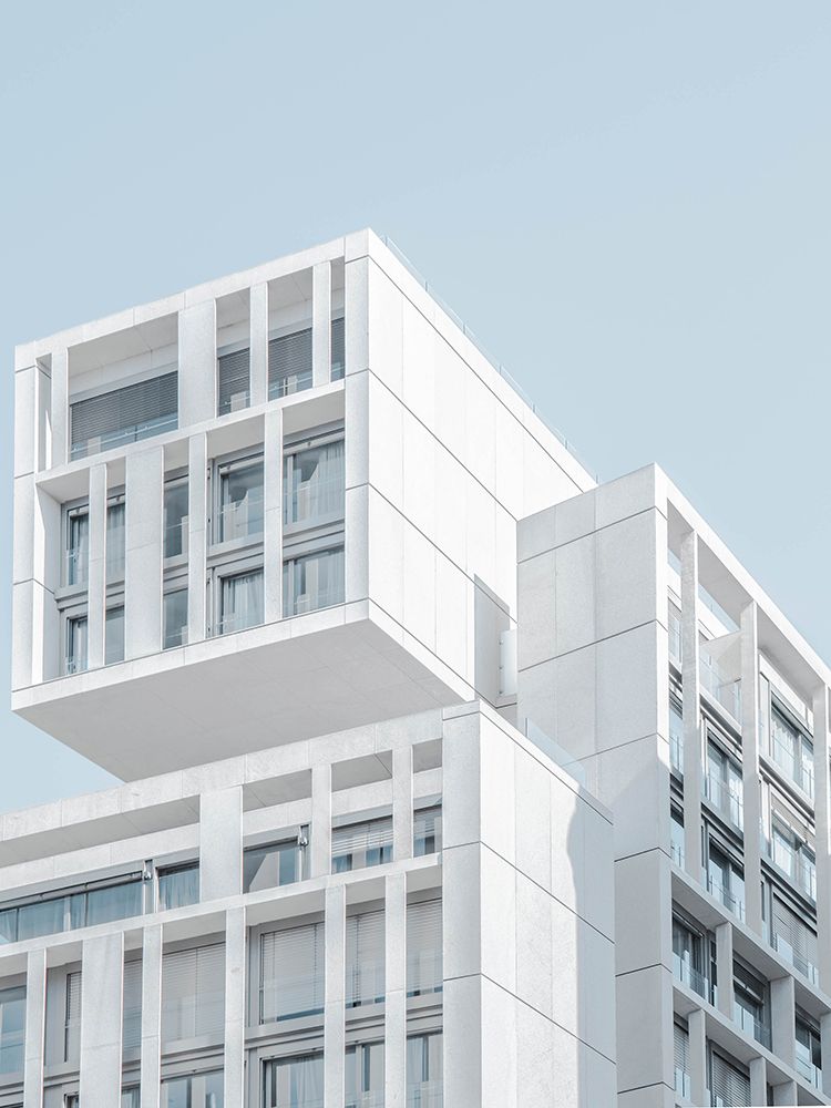 A white concrete apartment building in Madrid