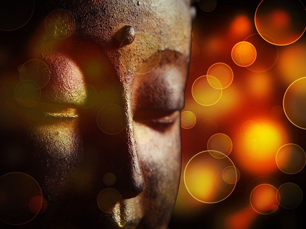 Antique Gold and Red Buddha Statue Closeup