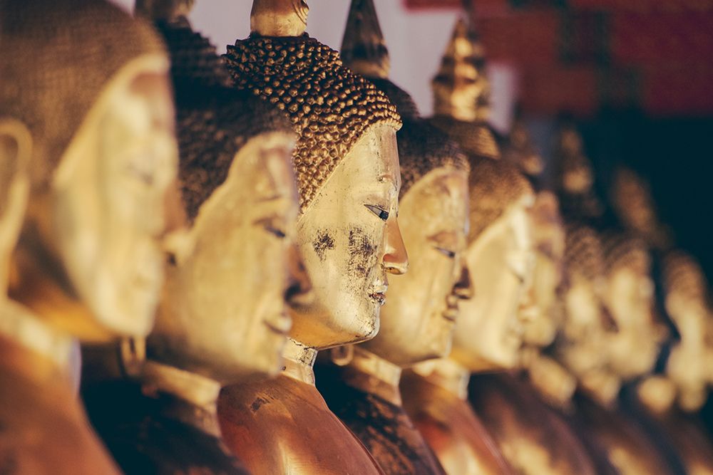 Golden Statues of Buddha in a Temple in Bangkok
