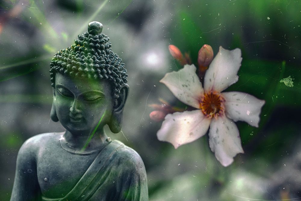 Peaceful Buddha statue with Flower