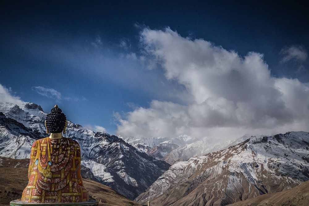 Sitting Buddha Overlooking Mountains