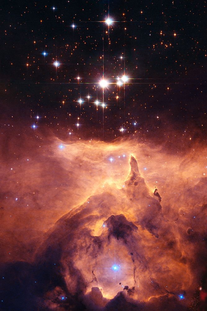 The Star Cluster Pismis 24 lies in the core of the large Emission Nebula NGC 6357