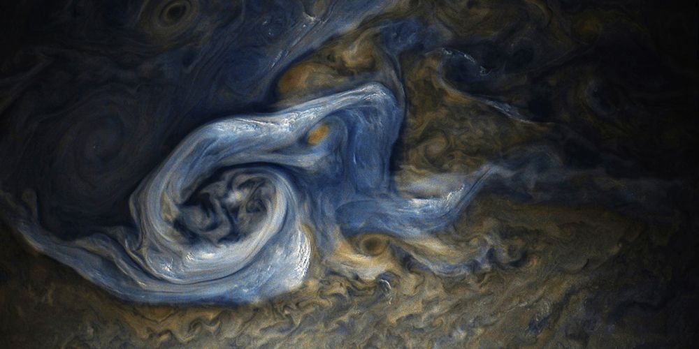 This color-enhanced image of a raging storm on Jupiter was taken by Juno Spacecraft