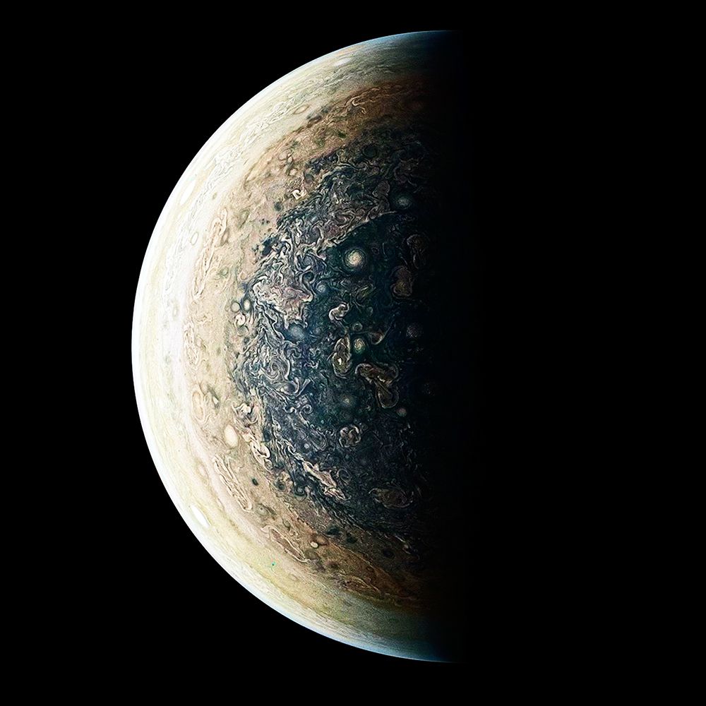 This enhanced-color image is of Jupiters South Pole and its Swirling Atmosphere